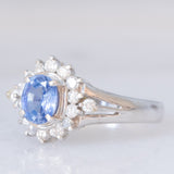 Anello margherita vintage in platino con zaffiro (0.75ct) e diamanti (0.31ctw), anni ‘80