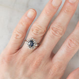 Anello a margherita vintage in platino con zaffiro (1.27ct) e diamanti (0.43ctw), anni ‘80