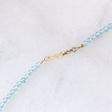 Collana moderna con acquamarine, perla bianca e oro giallo 14K