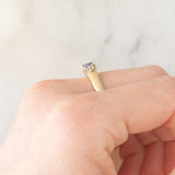 Vintage 9K yellow gold band ring with tanzanite (0.40ct approx.) and diamonds (0.12ctw approx.), year 2004