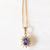 Vintage 18K yellow gold chain necklace with 18K yellow gold daisy pendant with sapphire (approx. 0.90ct) and brilliant-cut diamonds (approx. 0.36ctw), 70s