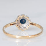 Anello a margherita vintage in oro giallo e bianco 9K con zaffiro (0.30ct ca.) e diamanti (0.10ctw ca.), anni ‘80