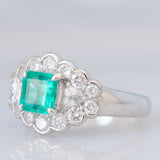 Anello a margherita vintage in platino con smeraldo colombiano (1.07ct) e diamanti (1.01ctw), anni ‘80