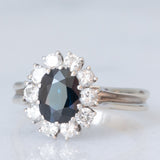 Vintage-Gänseblümchenring aus 18 Karat Weißgold mit Saphiren (ca. 1 ct) und Diamanten im Brillantschliff (ca. 0.60 ctw), 70er Jahre