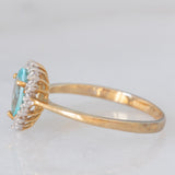 Anello a margherita a goccia in oro giallo 9K con apatite (0.59ct) e zirconi bianchi