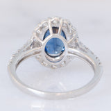Anello a margherita vintage in platino con zaffiro (1.40ct) e diamanti di taglio brillante (0.94ctw), anni ‘80/‘90