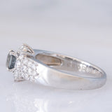 Vintage platinum daisy ring with color-change garnet (approx. 0.35ct) and diamonds (0.58ctw)