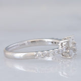 Anello a fiore vintage in platino con diamanti di taglio brillante (0.45ctw), anni ‘90