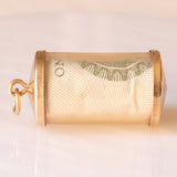 Colgante vintage para dinero de emergencia con forma de cilindro de plástico, oro amarillo de 9 quilates y billete de libra, 1978