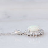 Collana vintage in platino con ciondolo con opale (1.78ct) e diamanti (0.56ctw)