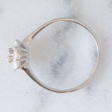 Anello a margherita vintage in oro bianco 14K con diamanti di taglio brillante (0.55ctw ca.), anni ‘80