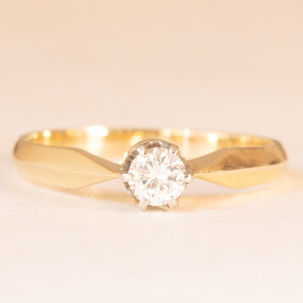 Solitario vintage in oro giallo e bianco 14K con diamante di taglio brillante (0.23ct ca.), anni ‘70