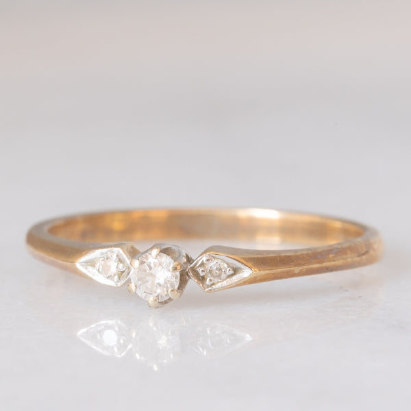 Trilogy vintage in oro giallo 9K con diamanti (centrale di taglio brillante e di 0.10ct ca.), anno 1995