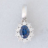 Ciondolo a margherita in oro bianco 14K con zaffiro (0.60ct ca.) e diamanti (0.20ctw ca.), anni ‘80
