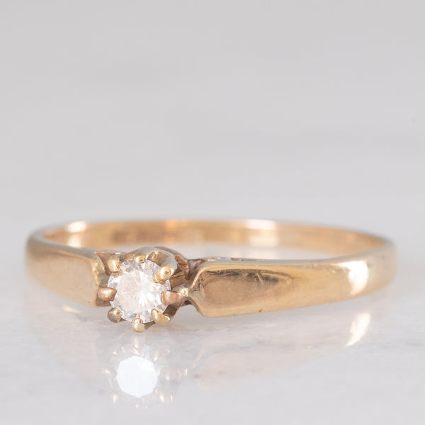 Solitario vintage in oro giallo 9K con diamante di taglio brillante (0.10ct ca.), anno 1989