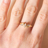 Vintage-Ring aus 14-karätigem Gelb- und Weißgold mit zentralem Diamanten im Marquise-Schliff (ca. 0.25 ct) und seitlichen Diamanten im konischen Schliff, 70er/80er Jahre