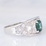 Anello a fascia in platino con tormalina verde (1.13ct) e diamanti (0.38ctw) e con lavorazioni a traforo, anni '90/anni '2000