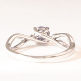 Vintage 18K white gold ring with tanzanite (approx. 0.40ct) and diamonds (approx. 0.12ctw), 80s/90s