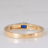 Solitario a fascia vintage in oro giallo 14K con zaffiro di taglio carré (0.18ct ca.), anni ‘70