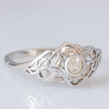 Anello Art Nouveau in oro bianco 18K con diamante di taglio vecchia miniera (0.10ct ca.), anni ‘20/‘30