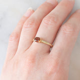 Solitario vintage in oro giallo 9K con granato (0.62ct ca.), anni ‘60/‘70