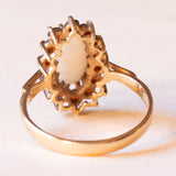 Винтажное кольцо с ромашкой из желтого золота 9 карат, опалом (около 0.80 карата) и гранатами (около 0.35 карата), 1980 г.