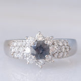 Vintage platinum daisy ring with color-change garnet (approx. 0.35ct) and diamonds (0.58ctw)
