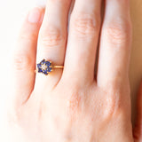 Vintage 14K yellow gold daisy ring with synthetic sapphires (approx. 0.60ctw) and brilliant cut diamond (approx. 0.10ct), 80s/90s