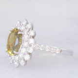 Anello a fiore vintage in platino con topazio verde (2.76ct) e diamanti (1.11ctw), anni ‘2000