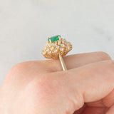 Anello ballerina vintage in oro giallo 14K con smeraldo (0.50ct ca.) e diamanti di taglio brillante e tapered (0.96ctw ca.), anni ‘80