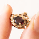 Vintage-Halskette mit drehbarem Anhänger aus 9-karätigem Gelbgold mit Quarz und Granat