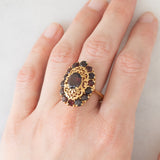 Anello vintage in oro giallo 18K con granati (3.50ctw ca.), anni ‘50/‘60