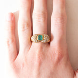 Vintage-Ring aus 18-karätigem Gelbgold mit Smaragd (ca. 0.50 ct) und Diamanten im Brillantschliff (ca. 0.66 ctw), 70er/80er Jahre