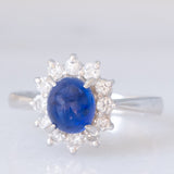Anello a margherita vintage in platino con zaffiro (1.20ct) e diamanti (0.40ctw), anni ‘70/‘80