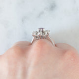 Anello a fiore vintage in oro bianco 14K con rubino (0.20ct ca.) e diamanti (0.20ctw ca.), anni ‘70