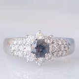 Vintage platinum daisy ring with color-change garnet (approx. 0.35ct) and diamonds (0.58ctw)