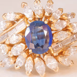 Vintage 18K yellow gold ring with sapphire (1.20ct approx.) and marquise and baguette cut diamonds (2.70ctw approx.), 70s