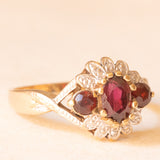 Vintage-Ring aus 9-karätigem Gelb- und Weißgold mit Granaten (ca. 0.70 ctw) und Diamanten, 60er Jahre