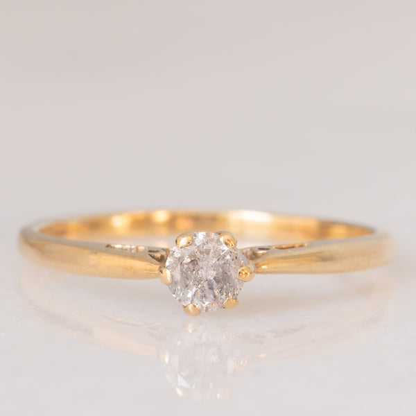Solitario vintage in oro giallo 9K con diamante salt and pepper di taglio brillante (0.25ct ca.)