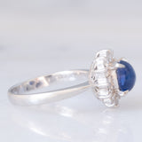 Anello a margherita vintage in platino con zaffiro (1.20ct) e diamanti (0.40ctw), anni ‘70/‘80
