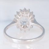Anello a margherita in oro bianco 9K con acquamarina (1ct ca.) e diamanti di taglio brillante (0.16ctw ca.), anno 2006