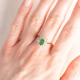 Bague marguerite en or jaune 14 carats avec émeraude (environ 0.70 ct) et diamants taille brillant (environ 0.80 ct), années 70