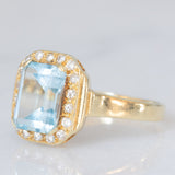 Anello vintage in oro giallo 14K con topazio azzurro (2.80ct ca.) e diamanti di taglio brillante (0.16ctw ca.), anni ‘80/‘90
