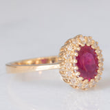Anello a margherita vintage in oro giallo 14K con rubino (1.50ct ca.) e diamanti (0.16ctw ca.), anni ‘70/‘80