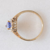Anello a margherita vintage in oro giallo e bianco 9K con tanzanite (0.60ct ca.), anni ‘90
