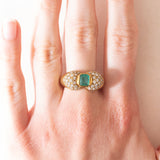 Vintage-Ring aus 18-karätigem Gelbgold mit Smaragd (ca. 0.50 ct) und Diamanten im Brillantschliff (ca. 0.66 ctw), 70er/80er Jahre