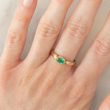 Solitario in oro giallo 9K con smeraldo (0.33ct)