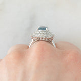 Anello a margherita vintage in platino con zaffiro (1.54ct) e diamanti (1.01ctw), anni ‘80