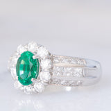 Anello a fiore vintage in platino con smeraldo (0.81ct) e diamanti (0.93ctw), anni ‘80
