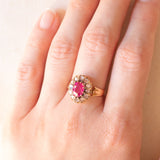 Antique 18K yellow gold daisy ring with synthetic ruby (1.60ct approx.) and rose cut diamonds (0.24ctw approx.), early 900s